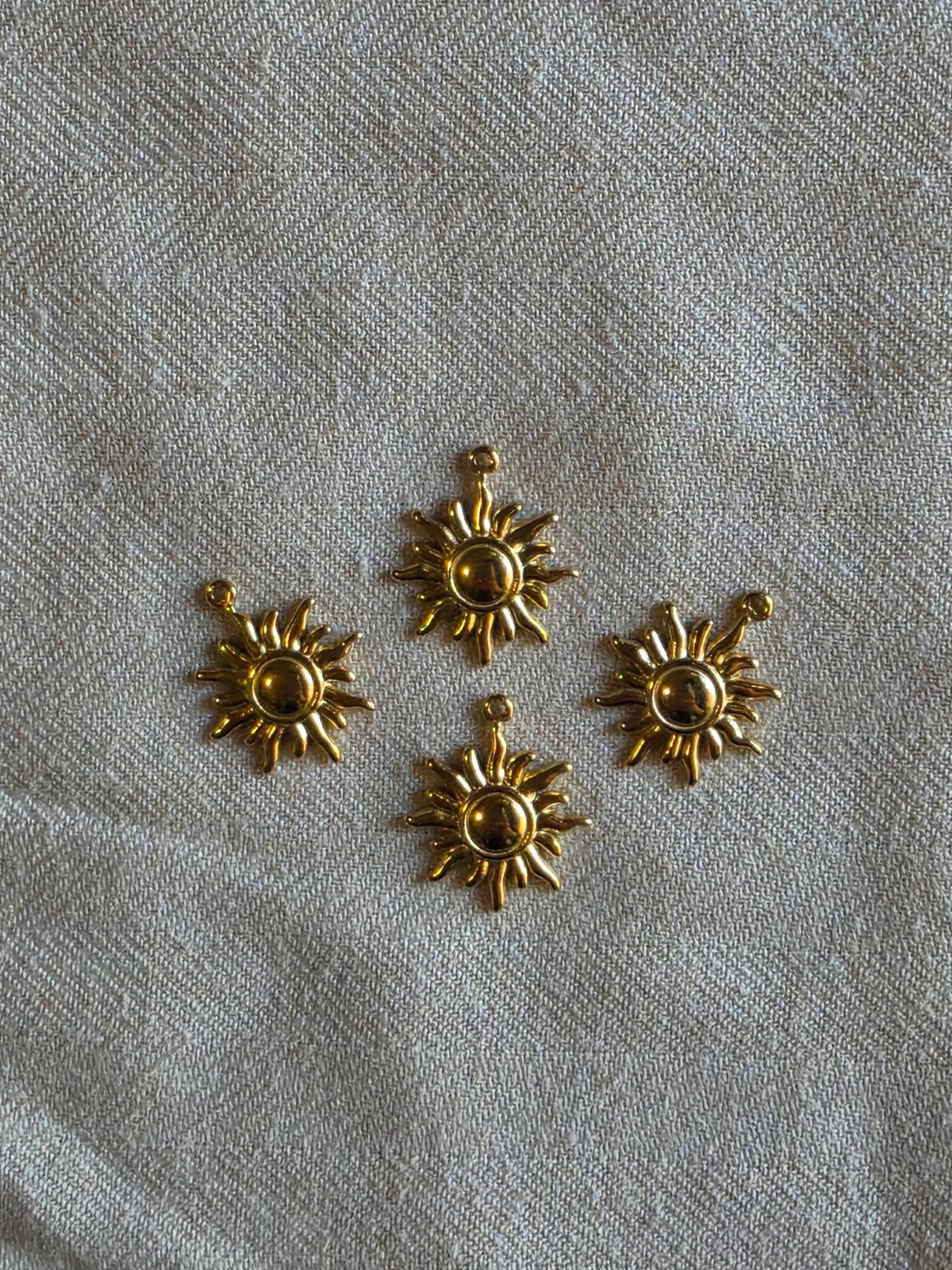 Smaller sun charm (stainless)