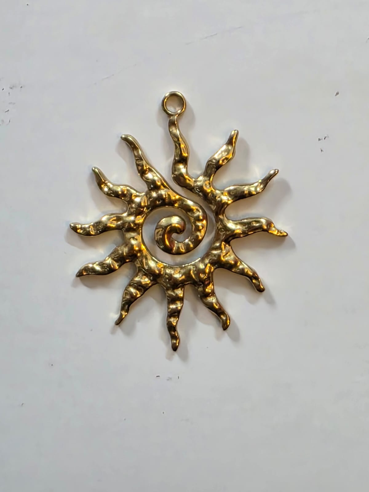 Spiral sun charm (stainless)