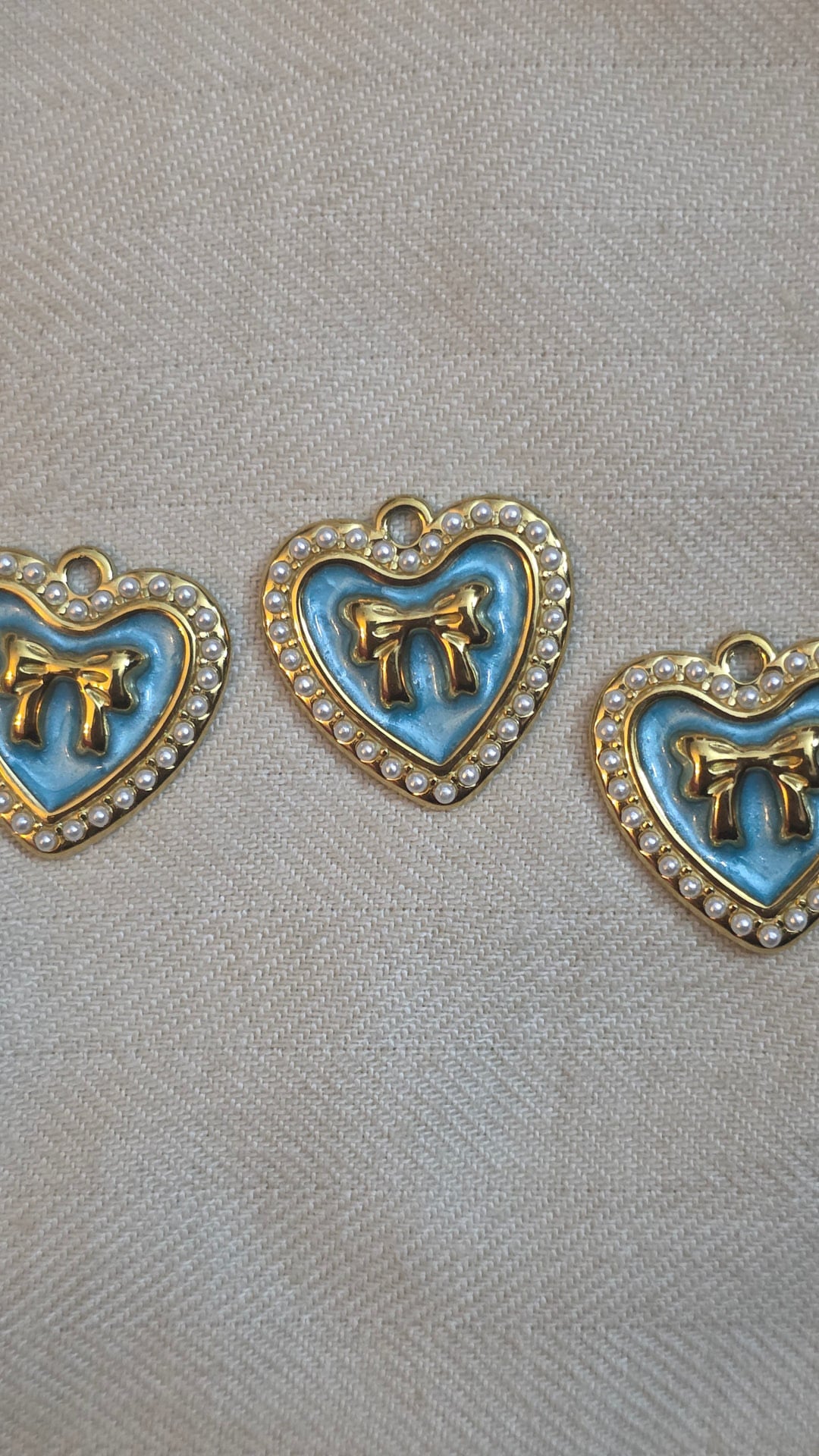 Turquoise heart bow charm (stainless)
